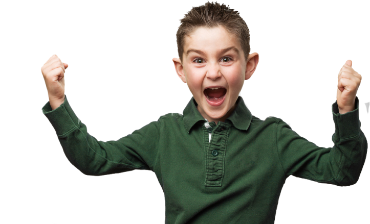 a young boy with his arms in the air