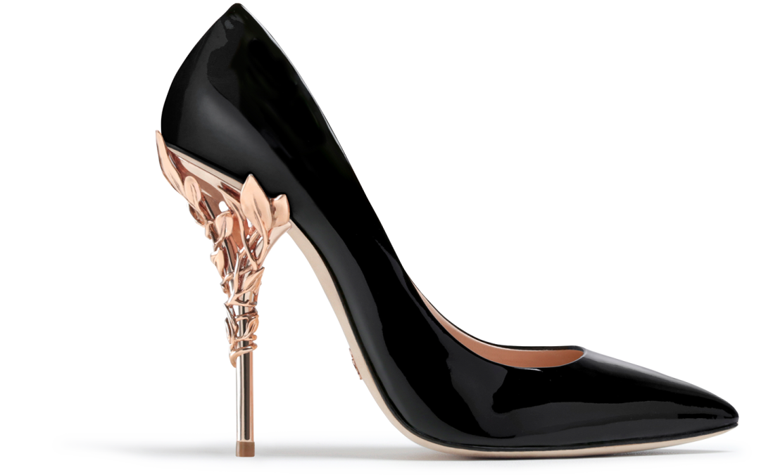 a pair of black and gold high heels