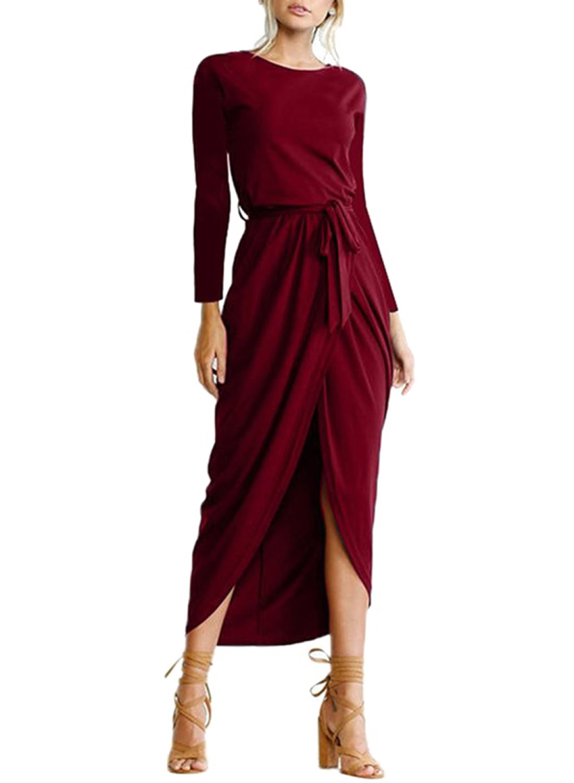 a woman wearing a burgundy dress with long sleeves