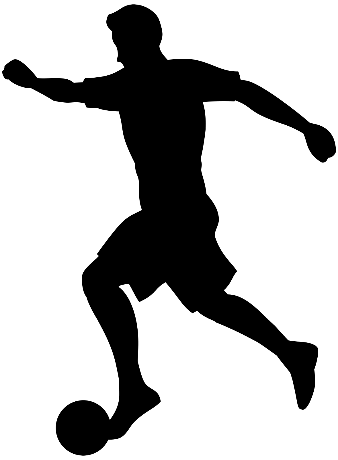 a silhouette of a soccer player kicking
