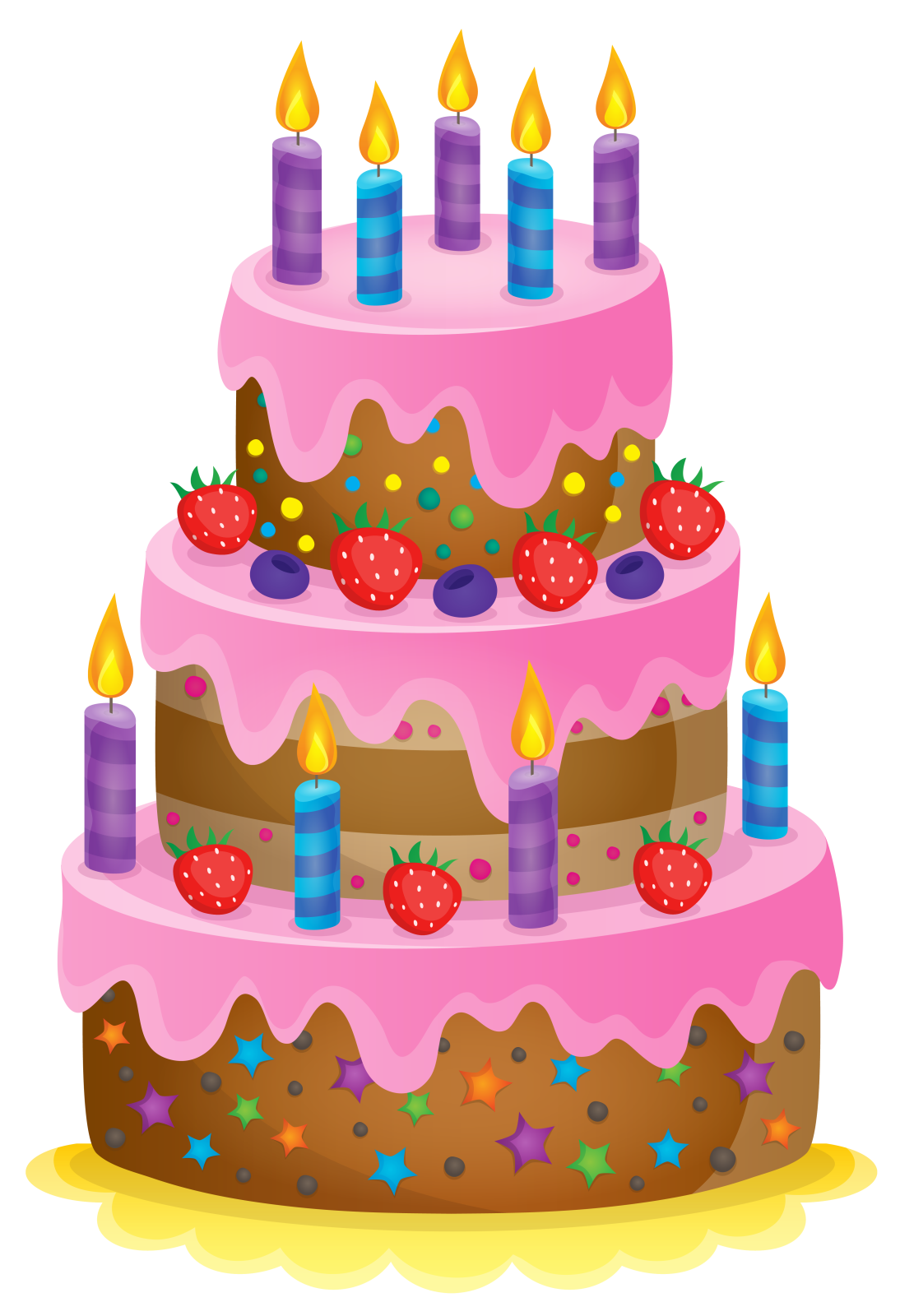 a birthday cake with candles and strawberries